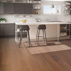 Kitchen with bar stools and light wood floors, inviting atmosphere