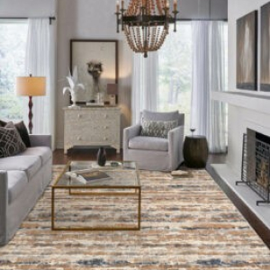Elegant area rug in a luxurious living room with chandelier, mirrors, and modern decor