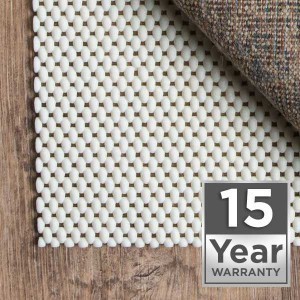 White textured rug pad with grid-like pattern and 15-year warranty badge