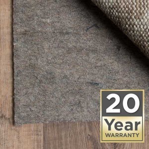 Thick felt premium rug pad in dark gray with 20-year warranty badge
