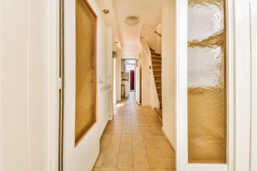 Tile floors in narrow hallway