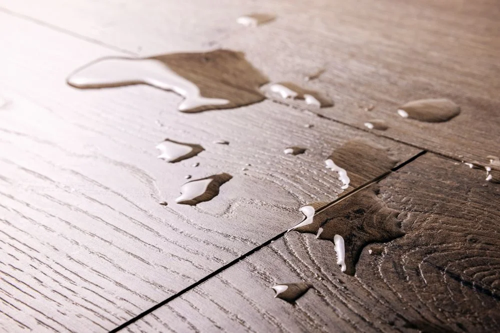Large water drops on laminate flooring
