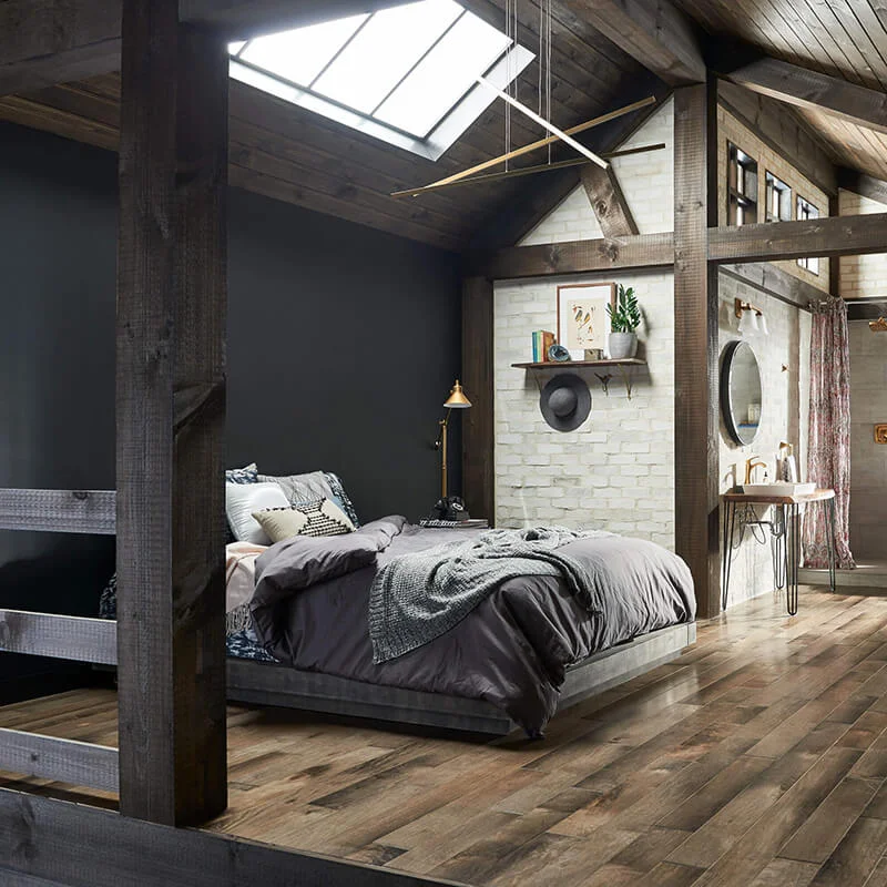Rustic hardwood floors in bedroom
