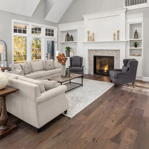 Beautiful luxury vinyl floors in vaulted ceiling living room