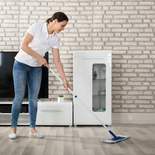 Woman mopping tile floors
